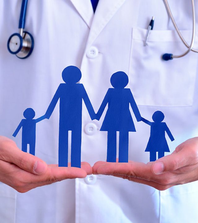 Caucasian,General,Doctor,Taking,Family,Cut.,Concept,Of,Family,Health Caucasian general doctor taking family cut. Concept of family health insurance.. Horizontal composition.